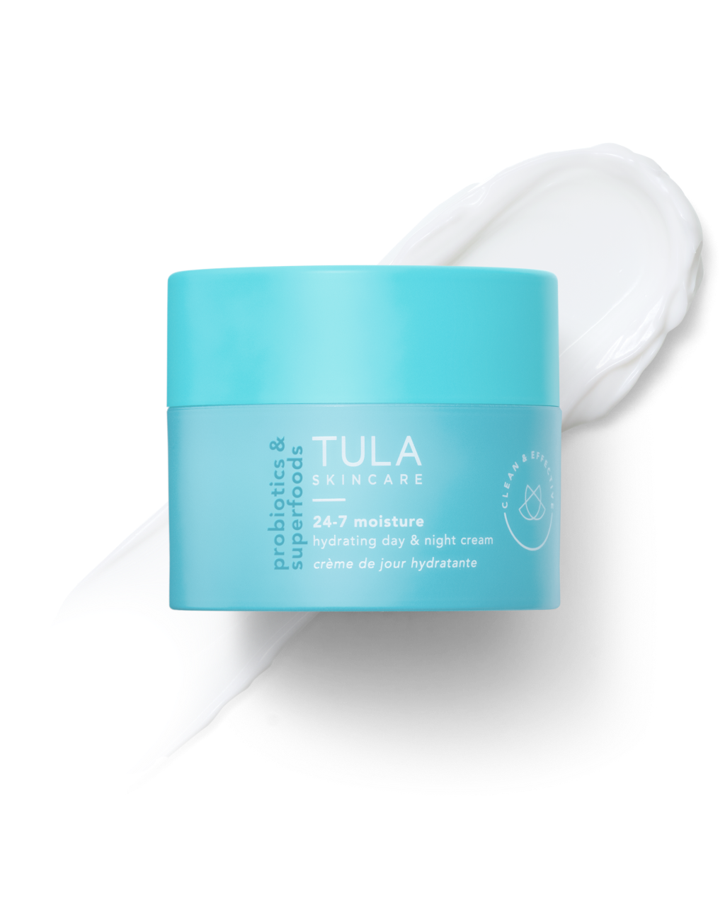 A jar of TULA 24-7 Moisture Hydrating Day & Night Cream in aqua packaging beside a swatch of white cream.